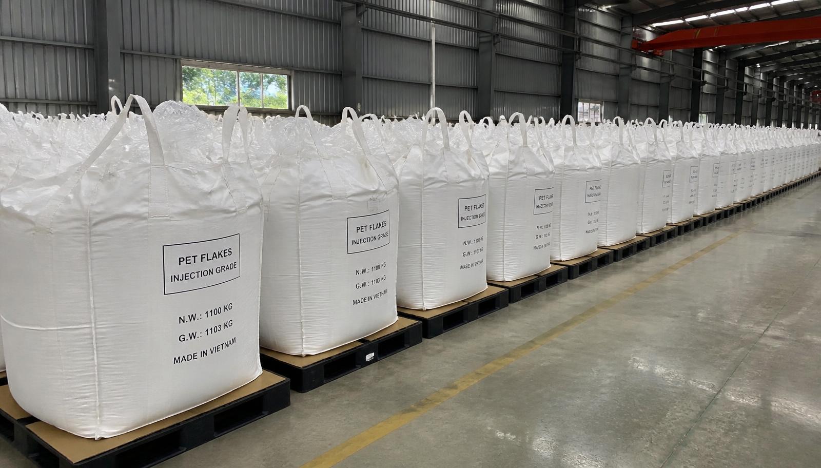 Jumbo bags filled with recycled PET flakes prepared for container export